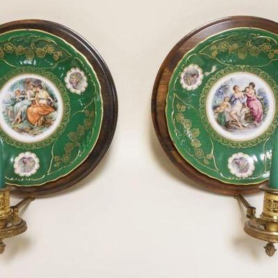 1047	PAIR OF CANDLE SCONCES W/MOUNTED PORCELAIN PLATES, EACH APPROXIMATELY 12 IN ROUND
