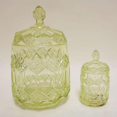 1062	PRESSED GLASS VASELINE COVERED JARS, TALLEST APPROXIMATELY 9 1/2 IN
