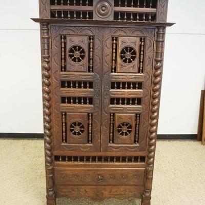 1224	ENGLISH OAK BRENTON CABINET, CARVED 2 DOOR OVER 1 DRAWER WITH CARVED WAGON WHEEL AND SPINDLES, SOME LOSS, APPROXIMATELY 43 IN X 18...