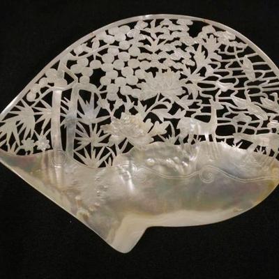 1110	INTRICALLY CARVED MOTHER OF PEARL & FRETWORD SHELL, APPROXIMATELY 9 IN X 7 1/2 IN
