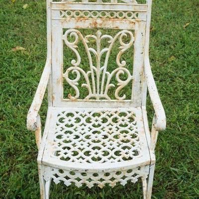 1254	ORNATE CAST METAL GARDEN PATIO ARM CHAIR, APPROXIMATELY 20 IN X 18 IN X 38 IN H
