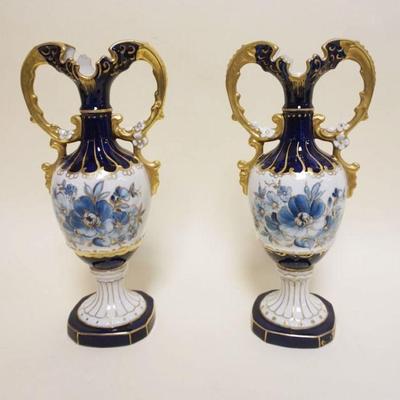 1042	PAIR OF ROYAL DUX VASES, DOUBLED HANDLED, EACH APPROXIMATELY 11 1/2 IN HIGH
