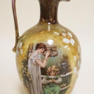 1053	AUSTRIAN EWER, IMAGE OF WOMAN W/LITTLE GIRL HOLDING PEEPS, ARTIST SIGNED, APPROXIMATELY 8 IN HIGH
