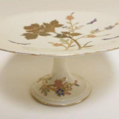 1044	PORCELAIN HAND PAINTED BOLTED COMPOTE W/IMAGES OF BUTTERFLIES, DRAGONFLIES & FLOWERS, APPROXIMATELY 9 1/2 IN X 4 1/2 IN
