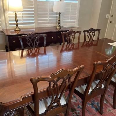 Lexington Chippendale Table with 10 chairs 
Table dimensions are 76” l with Two 24” leafs so Fully Extended would be 124 “ 
10 feet