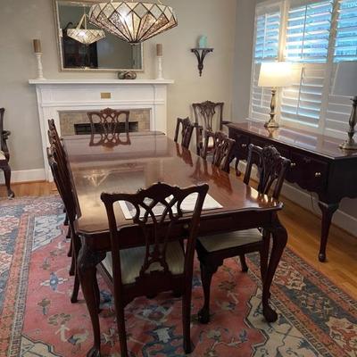 Lexington Chippendale Table with 10 chairs 
Table dimensions are 76” l with Two 24” leafs so Fully Extended would be 124 “ 
10 feet