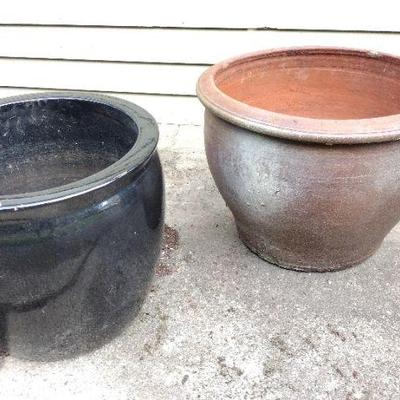 Two large planters.  (chips)