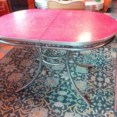 1950s small formica top table.  Some fade