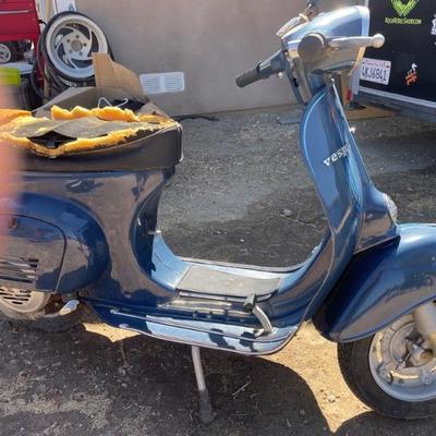 Vespa 125 needs seat and battery.