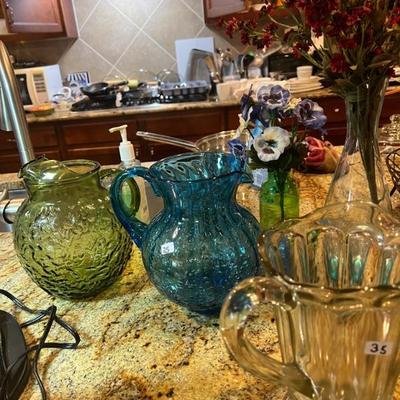 various vintage pitchers