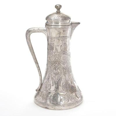 MONUMENTAL GERMAN SILVER COIN MOUNTED TANKARD | Carl Frey & Sohne, Breslau, 19th century; A tapering form tankard with a squat base...