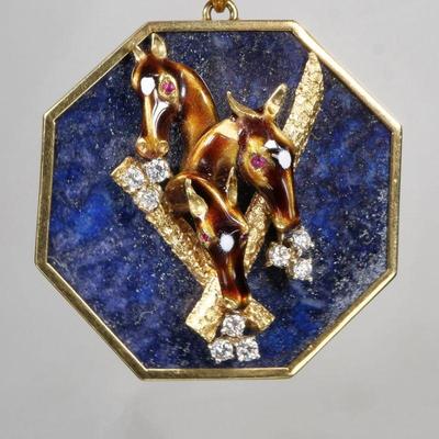 LAPIS, DIAMOND, ENAMEL & 18K GOLD PENDANT | An unusual pendant designed as an octagonal lapis set in an 18k gold surround, mounted by...