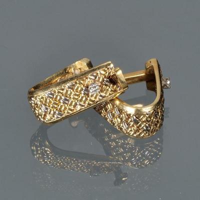 PAIR DIAMOND & 18K GOLD CUFFLINKS | Designed as woven 18k white and yellow god mounting two small melee diamonds, bar clasp with...