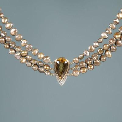 CITRINE, DIAMOND, & BAROQUE PEARL NECKLACE | Designed as a central 12.5 ct Pear Modified Brilliant Cut Citrine (21 x 12.7 x 10.4 mm)...