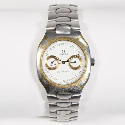 OMEGA POLARIS SEAMASTER WRISTWATCH | C. 1980's, white dial with gold sub dials, dot numerals, steel case and band with 18k gold...