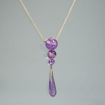 MCM AMETHYST ORB & GOLD PENDANT NECKLACE | Designed as three graduated carved amethyst spheres mounted in 14k rose gold, suspending a...