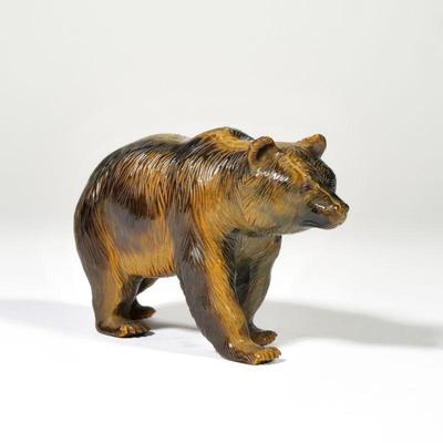 TIGER'S EYE CARVED BEAR | Finely carved tiger eye bear with red cabochon eyes, in the manner of Wedderien Inc., New York, with no...