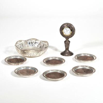 MISC. SILVER OBJECTS | Including a set of six wood-lined sterling coasters, an openwork bowl marked "silver" (dia. 6 inn.), and...