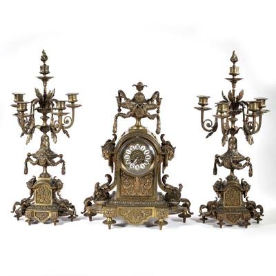 (3pc) G. PHILIPPE FRENCH BRONZE CLOCK GARNITURE | Including a clock, marked "G. Philippe" on the movement, with enameled plaque...