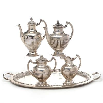 (5pc) GERMAN SILVER TEA & COFFEE SET | German 800 silver coffee and tea service comprising a coffee pot, tea pot, open pitcher, and...