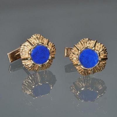 PAIR LAPIS LAZULI & 14K GOLD CUFFLINKS | Each having a central round polished lapis lazuli in a molded patterned gold surround; 3/4...