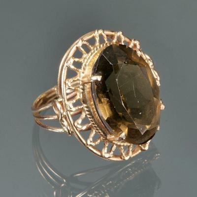 SMOKEY QUARTZ & GOLD ROPEWORK RING | An oval faceted smokey quartz set in yellow gold; size 6, 6.4g

