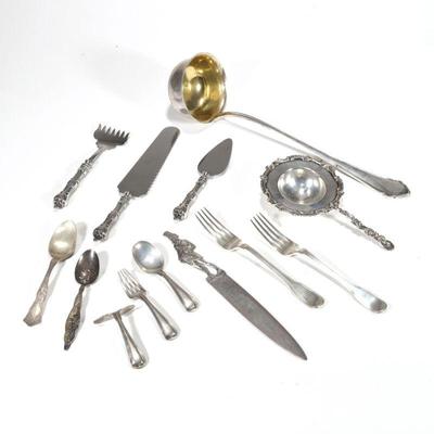 MISC. STERLING & 800 SILVER FLATWARE | Sterling silver flatware pieces, including a pair of Tiffany & Co. forks; a three-piece...