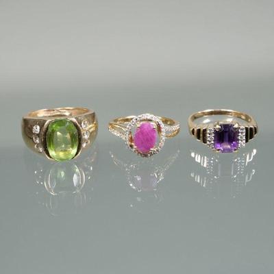 (3pc) 14K GOLD & GEMSTONE RINGS | Including an oval mixed cut green stone (11.8mm long) set with six small full cut diamonds (size...