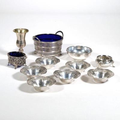 (11pc) SMALL STERLING DISHES | Sterling silver, including a set of 6 nut dishes, a cobalt glass lined bowl, a cobalt lined salt dish, a...