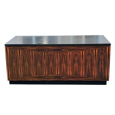MANNER OF LEON ROSEN ROSEWOOD EXECUTIVES DESK | An impressive bespoke executives desk, two drawers over two cabinet doors, one with lower...