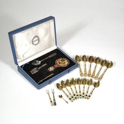 (21pc) RUSSIAN GILT & ENAMEL SILVER SPOONS | Including a four piece silver and enamel tea spoon set, including a tea scoop, spoon,...
