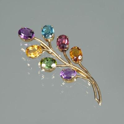 MULTICOLOR GEMSTONE & 18K GOLD LEAF PIN | Designed as (tested to) 18k gold wire branches, each supporting a different oval mixed cut...