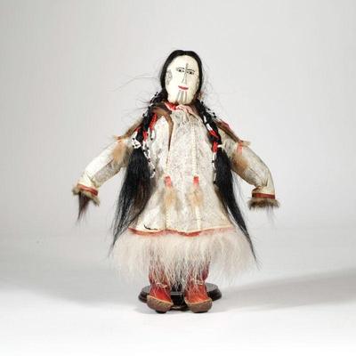 NATIVE ALASKAN SEALSKIN DOLL | Savoonga sealskin, hair, and fur doll with leather boots and face, fur pants, and sealskin coat, the face...
