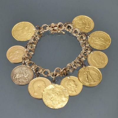 ANTIQUE GOLD COIN CHARM BRACELET | Designed as 10 early European gold coins with soldered bails suspended from a 14k gold triple-hoop...