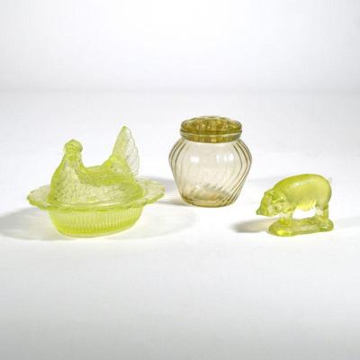 (3pc) FIGURAL VASELINE GLASS | Included a moulded Vaseline glass pig, a bud vase, and a chicken-form covered dish.

