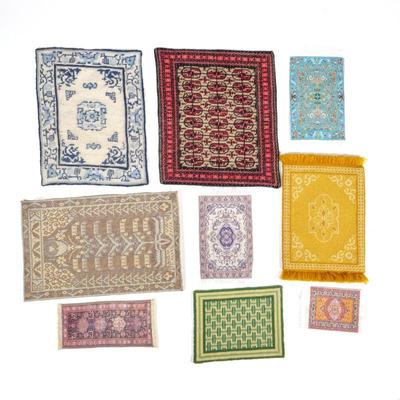 (9pc) DOLLHOUSE MINIATURE RUGS | Including a blue Chinese-style carpet (9-1/2 x 7 in.), a red overall pattern rug (9-1/2 x 8-1/4 in.),...