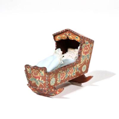 NATASHA PAINTED DOLLHOUSE CRADLE | Dollhouse miniature cradle with hand-painted decoration, with baby inside; signed "Natasha",...
