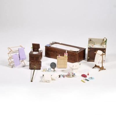 DOLLHOUSE BATHROOM FURNITURE | Miniature dollhouse bathroom fixtures and furniture, including a wood paneled bath tub, toilet, sink,...