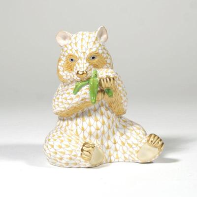 HEREND PORCELAIN PANDA BEAR | Panda bear in yellow fishnet with gilt highlights, marked and numbered on the bottom - l. 4 x w. 4 x h. 5...