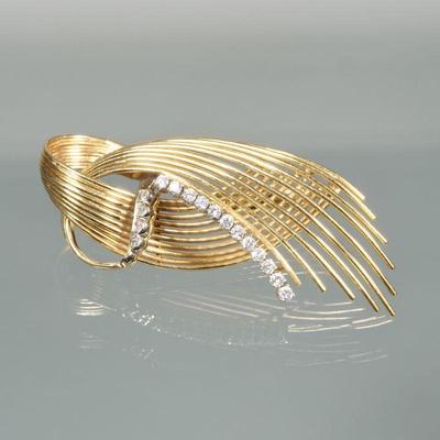 DIAMOND & 18K GOLD CONTEMPORARY PIN | Designed as a line of 12 prong-set melee diamonds and a line of 4 bezel set melee diamonds in...