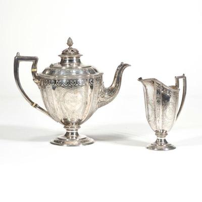 (2pc) ENGLISH STERLING TEAPOT & PITCHER | Sterling silver teapot with acorn finial with London hallmarks and date marks c. 1878, with...