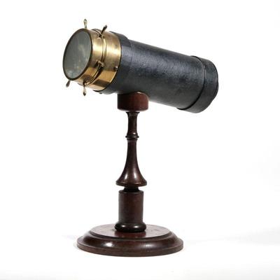 CHARLES G. BUSH KALEIDOSCOPE | An American C. G. Bush & Co. tabletop kaleidoscope mounted on a wood stand, Prov. R.I., pat. Nov. 11 -...