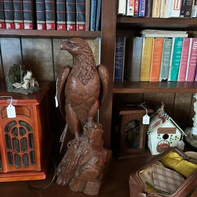This eagle watches over the house from its perch on the front room book shelves
