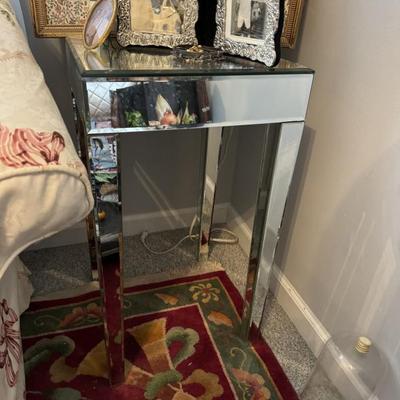 Two mirrored side tables