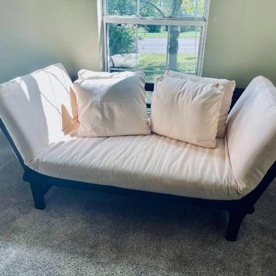 Lot 019-LIB: Futon/Loveseat

Features: 
•	Sturdy, stylish and functional
•	Both ends of the cherry-stained frame can be lowered to allow...