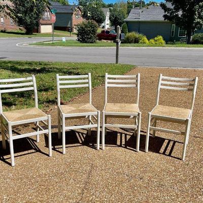 Lot 031-G: Quartet of Ladderback Chairs

Features: 
•	Four white ladderback chairs
•	Wood-framed with wicker seats

Dimensions: 16”W x...