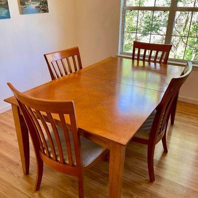 Lot 013-DR: Dining Table and 4 Chairs

Features: 
•	Shaker style wooden table and four chairs crafted by Universal Furniture
•	One leaf...