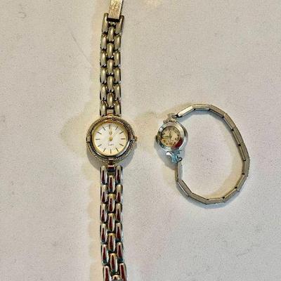 Lot 004a-J: Pair of Vintage Women’s Watches

Features: 
•	Alexander Julian Quartz wristwatch
•	Vintage Elgin 19-jewel wristwatch
o	10K...