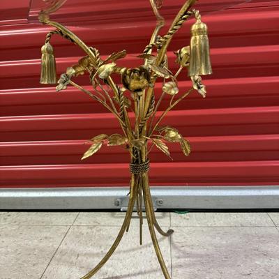 Vintage Italian Gold Metal Side Table. Features floral and tassel design. Needs a glass top. Measures 22” tall. 