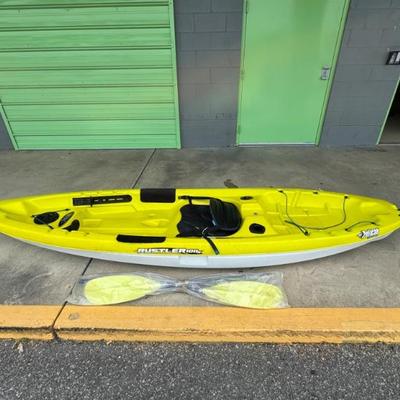  Yellow Pelican Rustler 100X open kayak with paddles. Ready for your next adventure! Measures 118 1/2” (9’ 10 1/2”) long and 29” wide....
